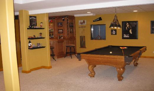 Remodeled basement with pool table